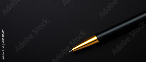 Wallpaper Mural Close-up view of luxurious black pen with golden tip on dark background, symbolizing sophistication and creativity. Torontodigital.ca