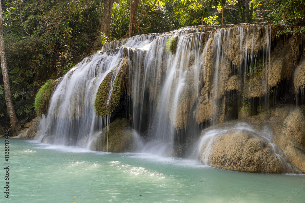 Erawan Waterfall in the rainforest in north of Kanchanaburi, Thailand Erawan Waterfall in the rainforest in north of Kanchanaburi, Thailand