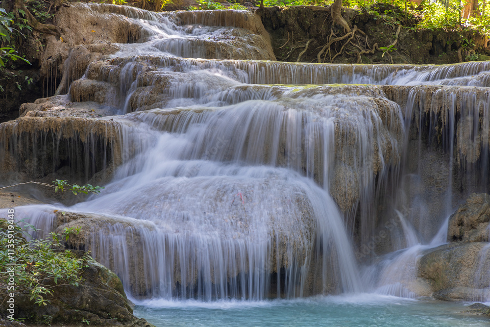 Obraz premium Erawan Waterfall in the rainforest in north of Kanchanaburi, Thailand