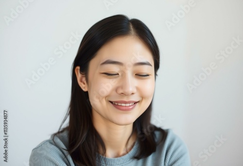 Half-length portrait of a serene female