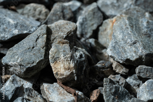 Rough black and white stone texture with natural rock and coal pattern on an old surface