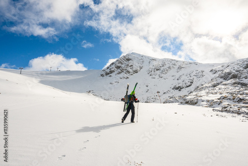 Skier Hiking Through Snowy Slopes at Parnassos Mountain