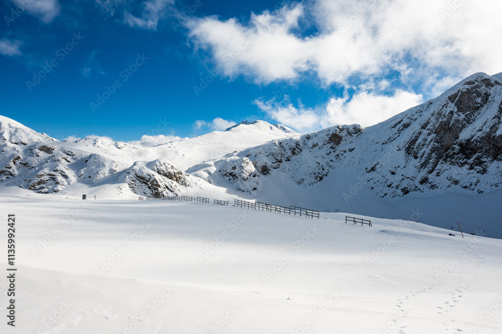 Snowy Slopes and ski lifts at Parnassos: A Serene View of the Ski Center in Greece's Majestic Mountain Range Snowy Slopes and ski lifts at Parnassos: A Serene View of the Ski Center in Greece's Majestic Mountain Range