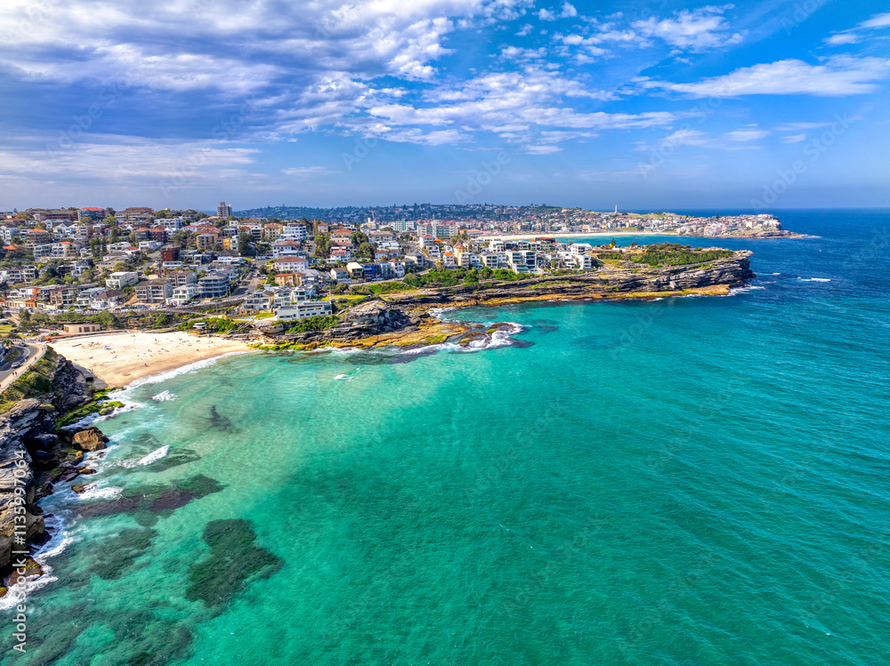 Fototapeta premium Aerial view of Tamarama Beach in Sydney, Australia with Bondi beach in the back.