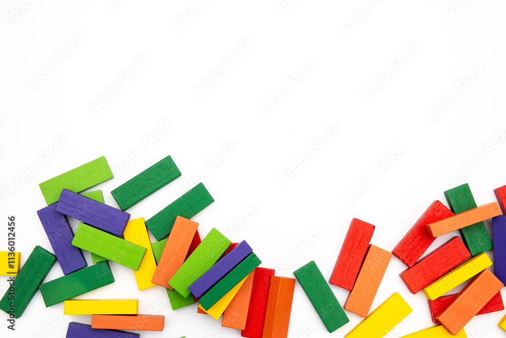 Colorful Wooden Building Blocks on White Background – Abstract Texture and Playful Design Colorful Wooden Building Blocks on White Background – Abstract Texture and Playful Design