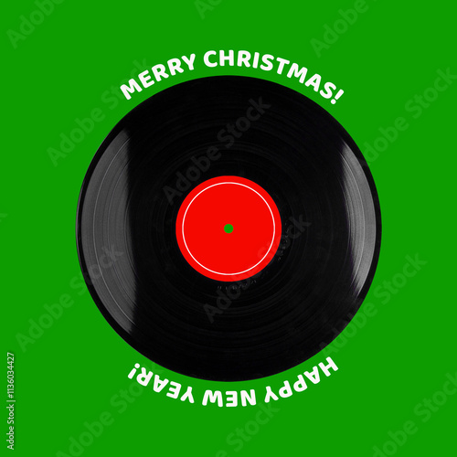 Vinyl record, on a green background. Merry Christmas and Happy New Year. Festive musical card. Musical