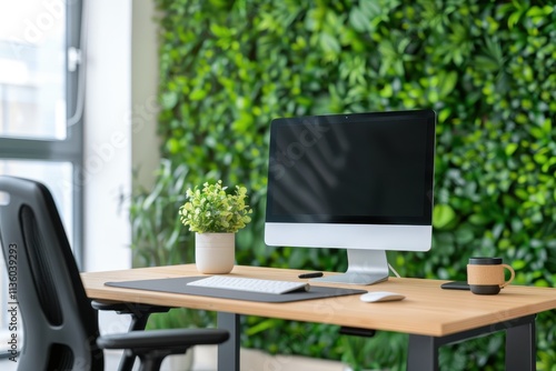 Wallpaper Mural A modern workspace featuring a computer on a wooden desk, surrounded by greenery, promoting a fresh and inviting atmosphere. Torontodigital.ca