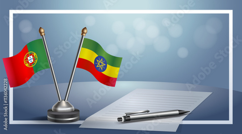 Portugal and Ethiopia National flags on small table with bokeh background, cooperative relationship