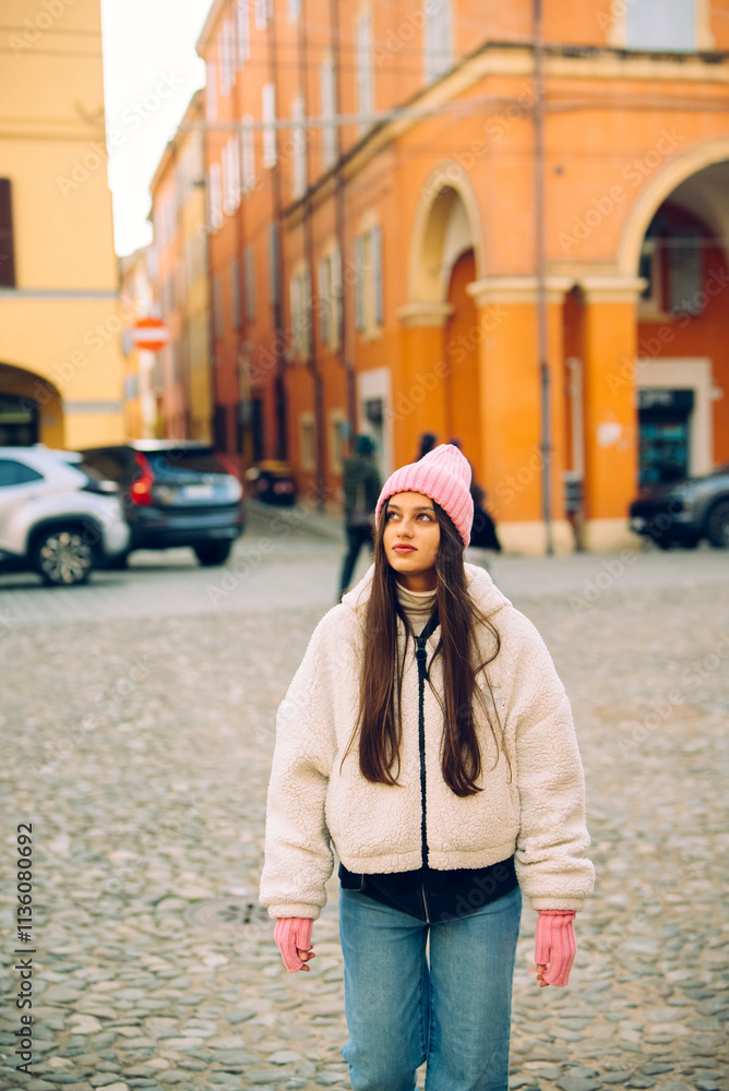 A Young Woman Enjoys an Relaxing Stroll in a Delightful, Charming Cobblestone Square A Young Woman Enjoys an Relaxing Stroll in a Delightful, Charming Cobblestone Square