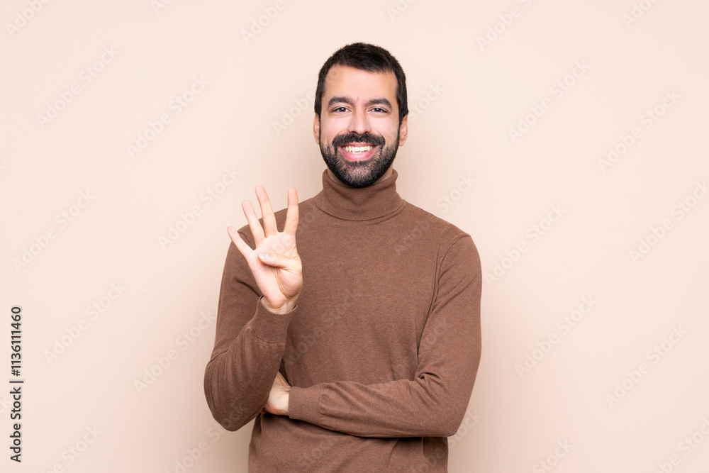 Man over isolated background happy and counting four with fingers Man over isolated background happy and counting four with fingers