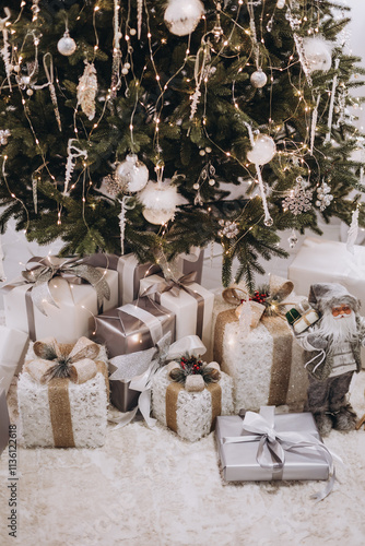 Presents under a christmas tree in the festive morning