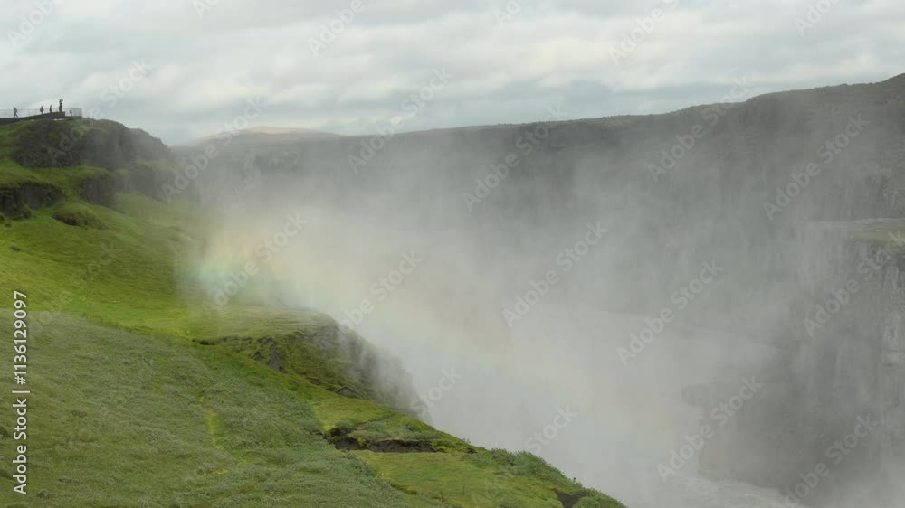 Rainbow over Dettifoss waterfall in Iceland Rainbow over Dettifoss waterfall in Iceland
