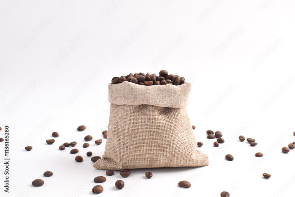 Roasted Coffee beans falling into the sack isolated on white background. Roasted Coffee beans falling into the sack isolated on white background.