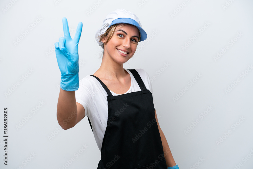 Fishwife woman isolated on white background smiling and showing victory sign Fishwife woman isolated on white background smiling and showing victory sign