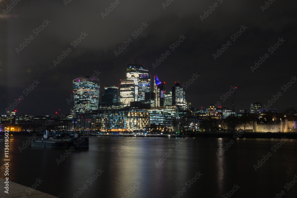 Beautiful night view of the London financial District across the Thames River