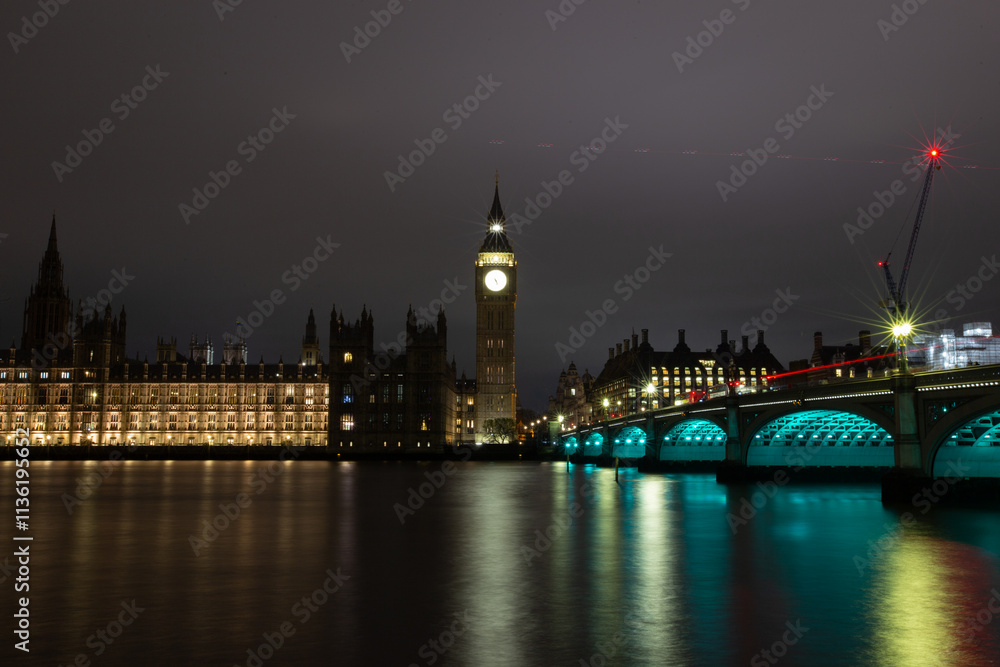 Fototapeta premium Big Ben and Westminster Bridge, London, illuminated at night