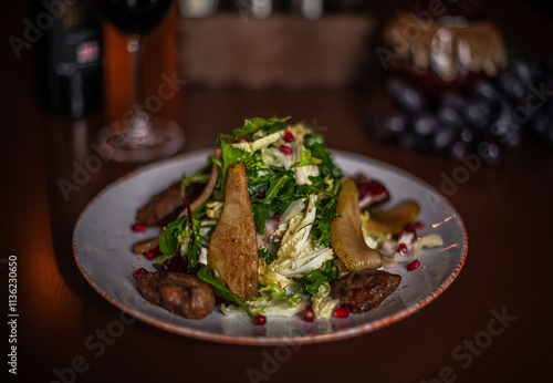 pear and beef liver salad on the restaurant table