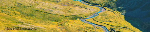 Obraz na płótnie Beautiful nature background. Panorama landscape. Texture of earth. Winding mountain river. Aerial view. Horizontal banner w salonie