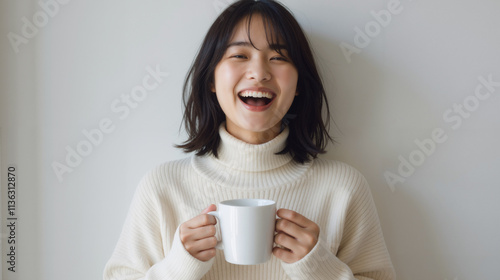 Cheerful Young Woman in Cozy Sweater Holding a Mug