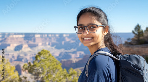Indonesian girl in blue athleisure doing outdoor activity at grand canyon