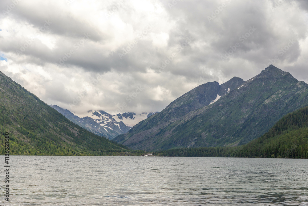 Multinskoye lake. Lake number three (or third lake or lower lake). The Multin lakes near Multa village, Altai republic, Russia Multinskoye lake. Lake number three (or third lake or lower lake). The Multin lakes near Multa village, Altai republic, Russia