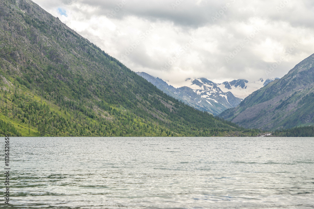 Multinskoye lake. Lake number three (or third lake or lower lake). The Multin lakes near Multa village, Altai republic, Russia Multinskoye lake. Lake number three (or third lake or lower lake). The Multin lakes near Multa village, Altai republic, Russia