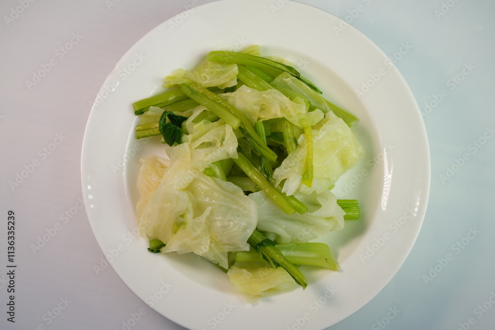 Cabbage and Chinese kale, boiled in hot water, Thai people like to eat them with chili paste. Cabbage and Chinese kale, boiled in hot water, Thai people like to eat them with chili paste.