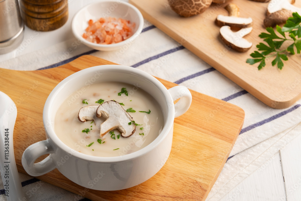 Creamy mushroom soup with Shiitake in ceramic bowl. Creamy mushroom soup with Shiitake in ceramic bowl.