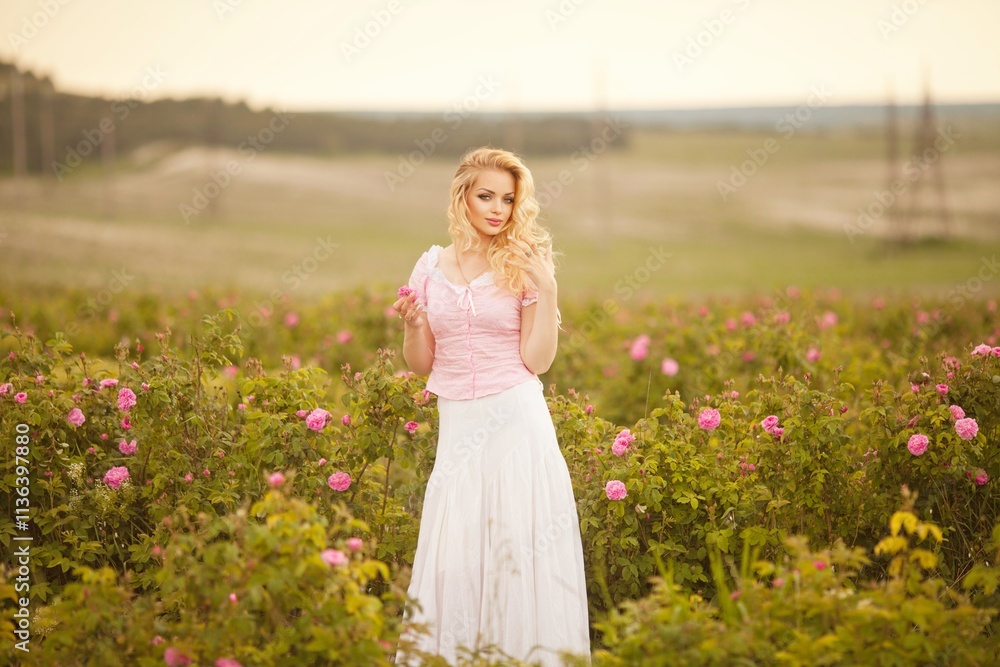 Spring Woman in Rose Field.