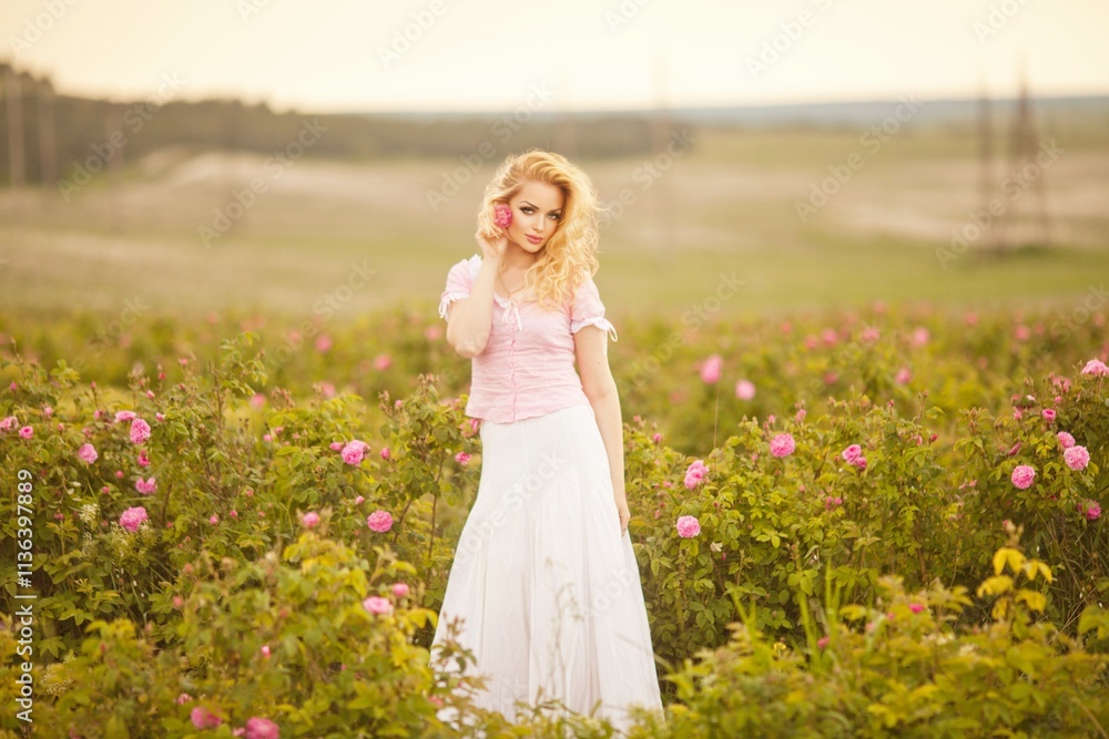 Spring Woman in Rose Field.