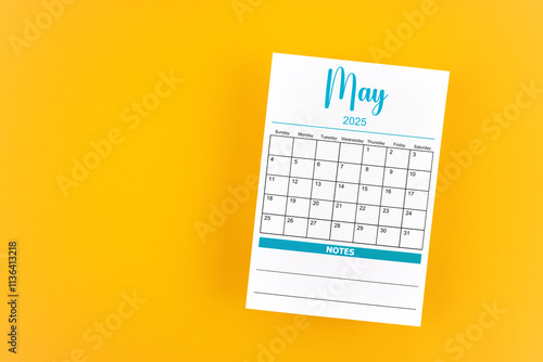 May 2025 calendar page on yellow background.