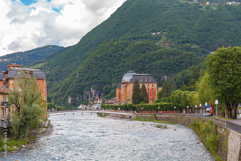 SAN PELLEGRINO TERME, ITALY - MAY 12, 2024: Old spa hotel by the river