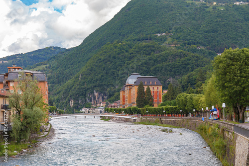 Obraz na płótnie SAN PELLEGRINO TERME, ITALY - MAY 12, 2024: Old spa hotel by the river w salonie