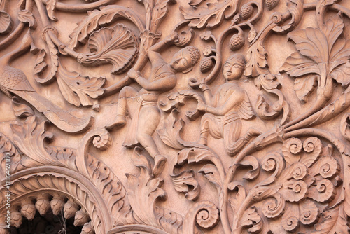A detail of decorative stucco patterns on old buildings in Vrindavan, India.