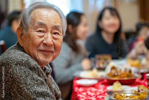 Elderly Family Member Celebrating Lunar New Year with Loved Ones in Joyful Atmosphere photo