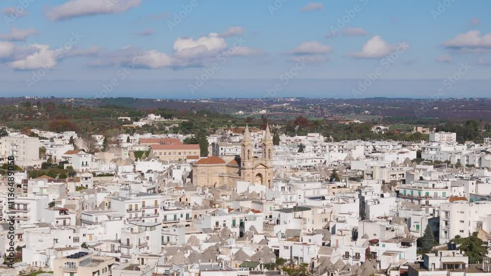 Aerial drone view of the church and town center in Alberbello, Puglia southern Italy Aerial drone view of the church and town center in Alberbello, Puglia southern Italy