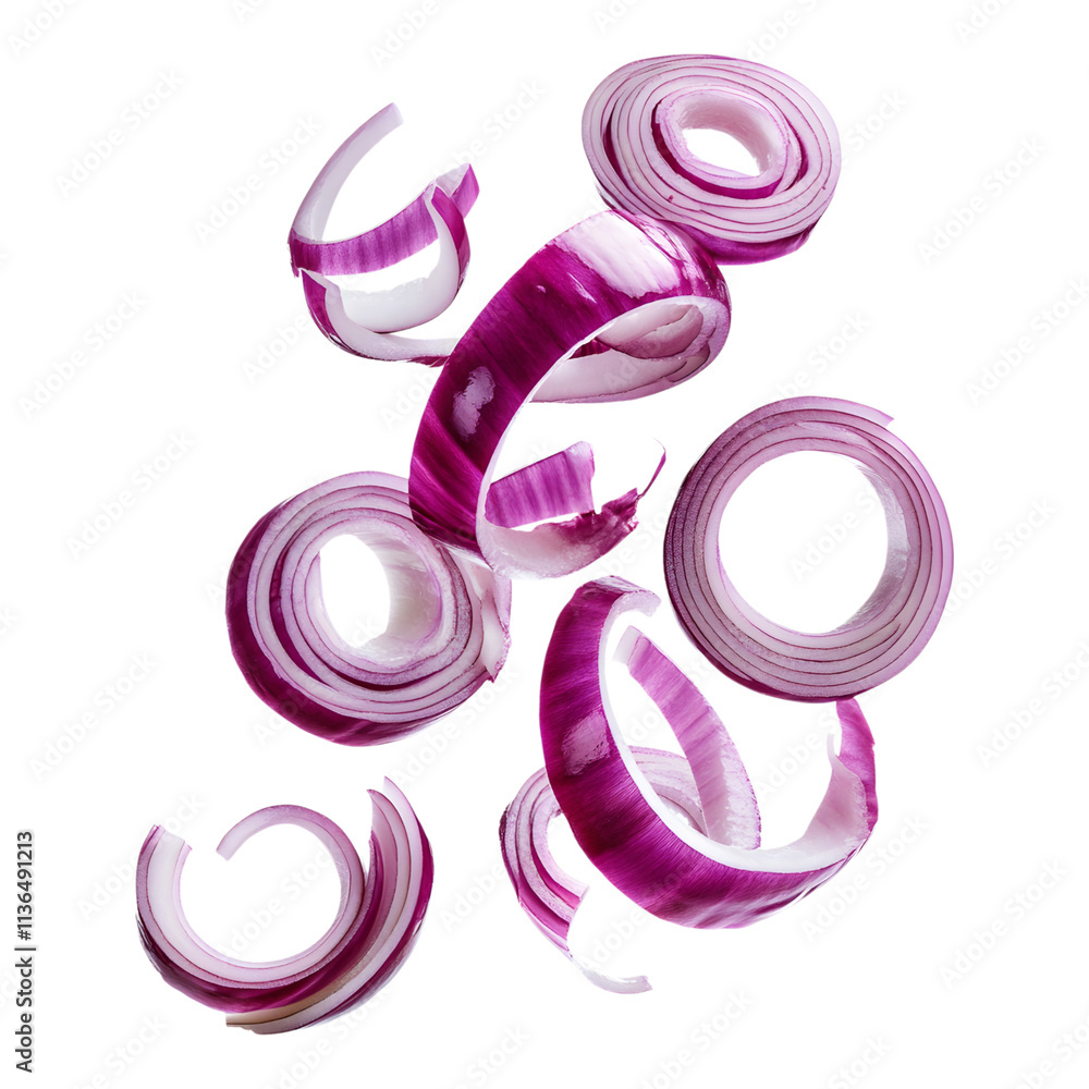 Flying sliced red onion rings create vibrant culinary display Flying sliced red onion rings create vibrant culinary display