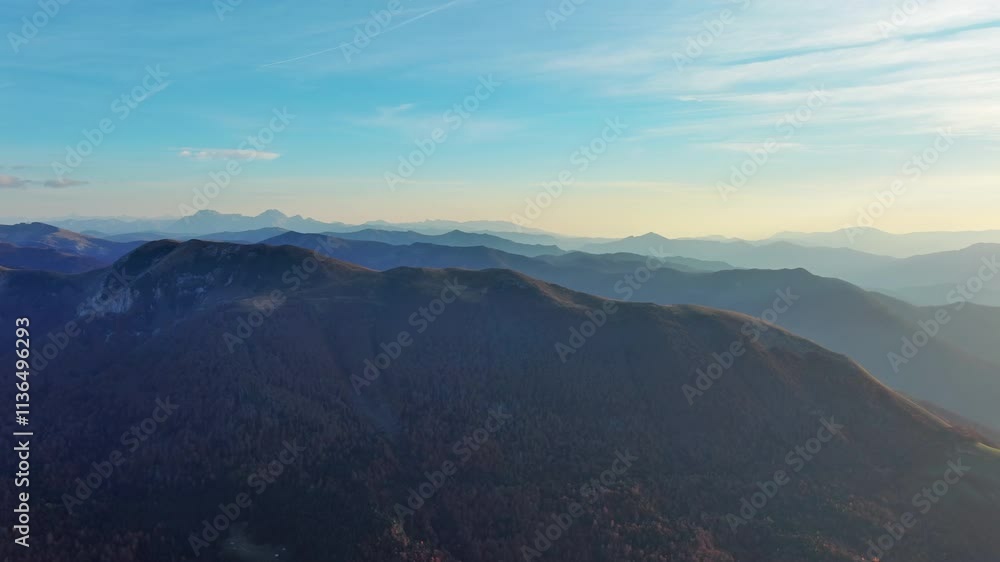 Flying over colorful foliage at sunset in mountains. Vibrant autumn landscape, panorama 4k Flying over colorful foliage at sunset in mountains. Vibrant autumn landscape, panorama 4k