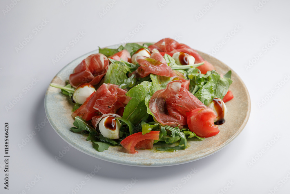 A plate of delicious meat and vegetables is on the table A plate of delicious meat and vegetables is on the table