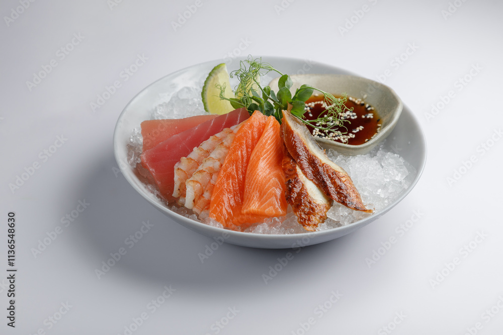 A beautifully arranged plate of food featuring ice and sauces placed on a table A beautifully arranged plate of food featuring ice and sauces placed on a table