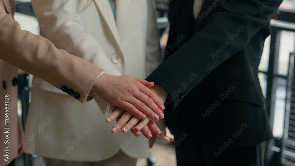 Fototapeta premium Business team success colleagues multiracial multiethnic women diversity Caucasian Asian Korean businesswomen girls female in office together stack hands teamwork cooperation union applause smiling