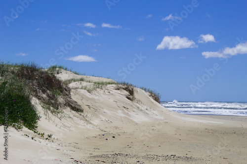 Sand dunes on Capao da Canoa beach in Brazil