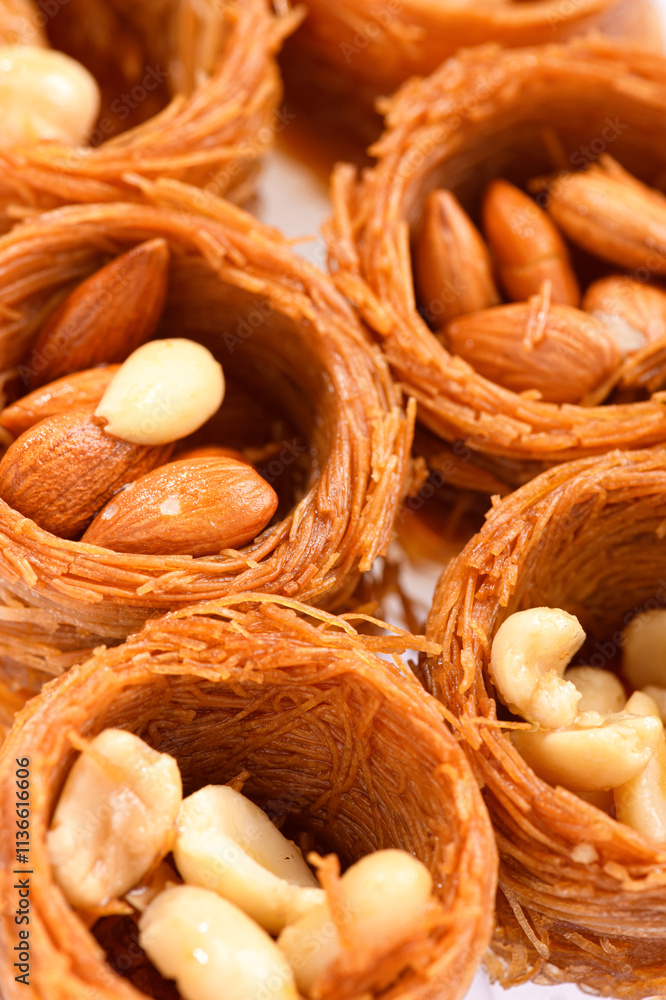 Sweet food Turkish delight, traditional food, bird's nest with honey and nut Sweet food Turkish delight, traditional food, bird's nest with honey and nut