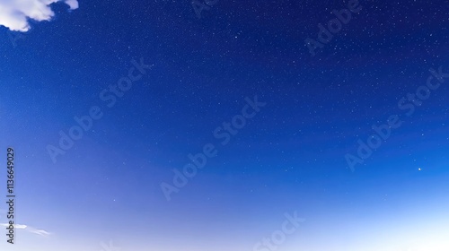 Twinkling Starry Night Sky with White Clouds and Blue Gradient Background, Capturing Vast Universe and Starlight, High Definition Long Exposure Photography Using Wide-Angle Lens, Low Angle Night View
