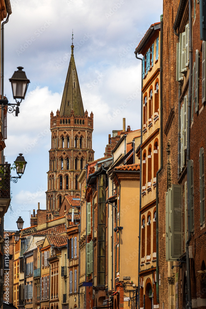 View of the bell tower of the Basilica of Saint-Sernin from Rue du Taur in Toulouse View of the bell tower of the Basilica of Saint-Sernin from Rue du Taur in Toulouse