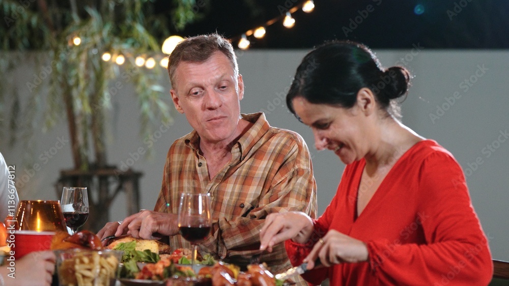 Family together for holiday celebration in garden. Old romantic senior drink wine have dinner. Outdoor camping activity, celebrate and spend time with lovely couple strengthen family bond. Divergence. Family together for holiday celebration in garden. Old romantic senior drink wine have dinner. Outdoor camping activity, celebrate and spend time with lovely couple strengthen family bond. Divergence.