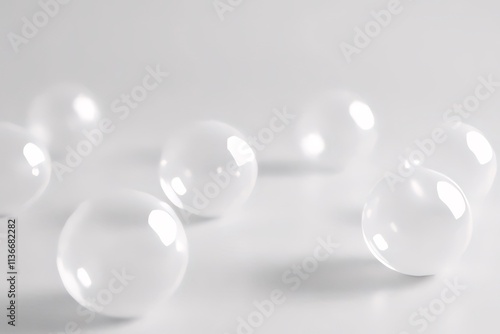 Close-up of several translucent spheres on a white background.