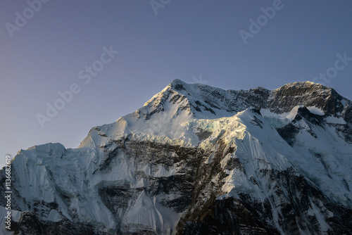 Mount Annapurna II before sunrise. Early morning view from Ghyaru village in Himalaya mountains. Annapurna circuit trekking, Nepal. photo