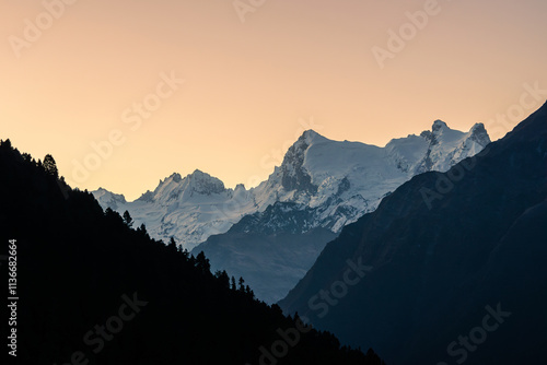 Lamjung himal mountain at sunrise, view from Ghyaru village. Annapurna circuit route, Himalaya, Nepal. photo