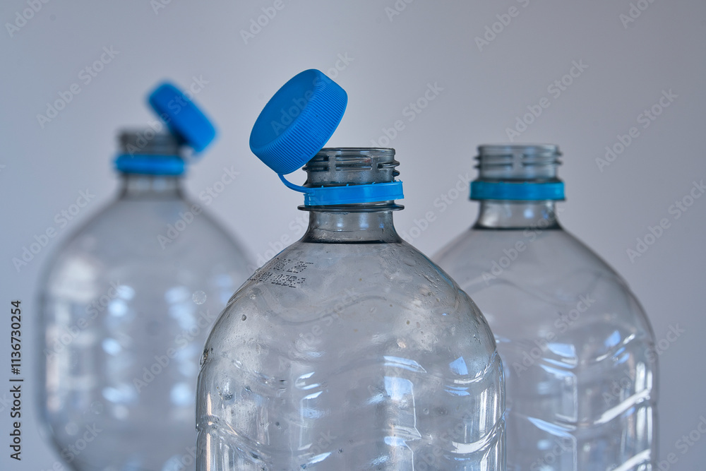 Close-up of opened bottles of mineral water. Close-up of opened bottles of mineral water.